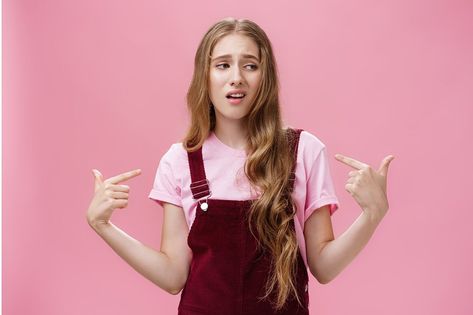 Self-assured arrogant young female student with high ego standing cocky and brag about herself pointing at her with cool snobbish look looking away to right with contempt posing over pink wall. Body language and emotions concept Snobby People, Ryan Giggs, Sense Of Entitlement, Bigger Person, Life Satisfaction, Intelligent Women, Genuine Smile, Greater Good, Life Improvement