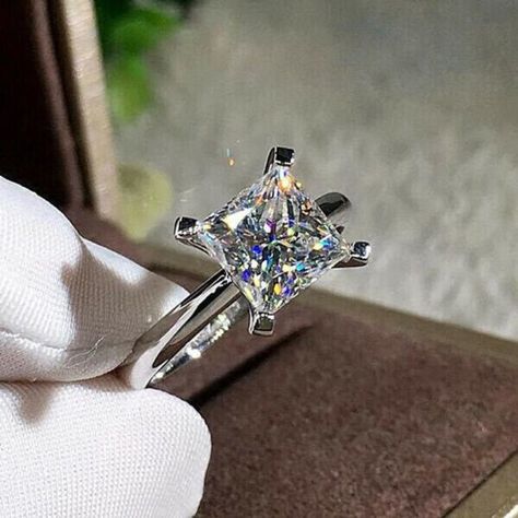 DESCRIPTION Type	:	Handmade Ring Metal	:	925 Silver, 10K, 14K, 18K Stone	:	Moissanite Diamond Stone Weight	:	2.10 CT Origin	:	Lab Created Shape	:	Princess Cut Style	:	Solitaire Cut	:	Excellent Color	:	Colorless Clarity	:	VVS1 Stone Size	:	8 mm Setting	:	Prong Set Princess Cut Engagement Rings, Versatile Jewelry, Diamond Anniversary Rings, Man Made Diamonds, Diamond Anniversary, Engagement Ring Cuts, Diamond Solitaire Engagement Ring, Classic Ring, Princess Cut Diamonds