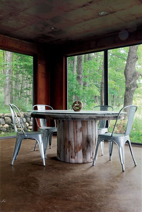 "Repurpose, refurbish, recycle" was the guiding principle for a metals broker in Ontario who harnessed his passion for–and knowledge of–industrial materials to create a new house from old scrap. Wire Spool Tables, Wooden Cable Reel, Cable Spool Tables, Wire Spools, Wooden Cable Spools, Spool Ideas, Spool Table, Spool Furniture, Enclosed Porch