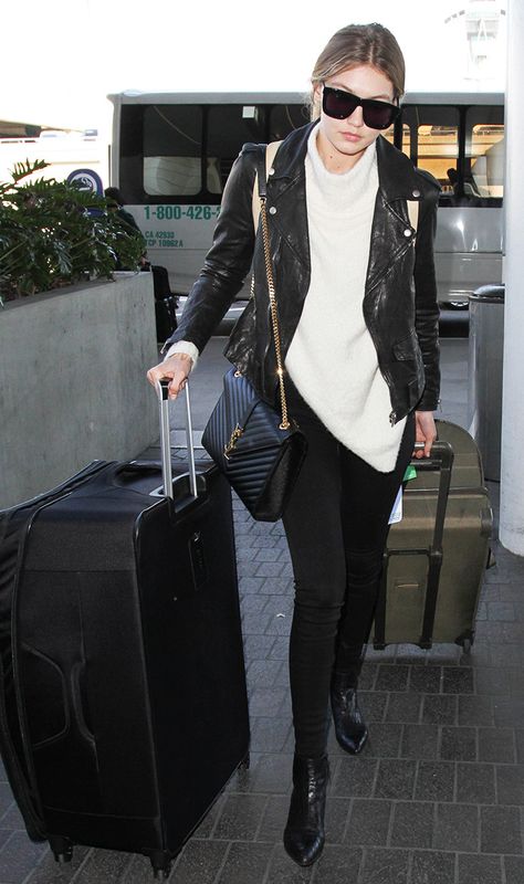 Gigi Hadid airport outfit - Nili Lotan jacket; Sally LaPointe sweater; Parker Smith Ava Skinny Jeans in Eternal Black ($155); Stuart Weitzman Zepher Bootie ($535); Karen Walker Deep Freeze Sunglasses ($250); Saint-Laurent bag. Gigi Hadid Airport Outfits, Woc Outfit, Dior Woc, Casual Leather Jacket Outfit, Gigi Hadid Style, Classy Winter Outfits, Hadid Style, Rosie Huntington Whiteley, Airport Style