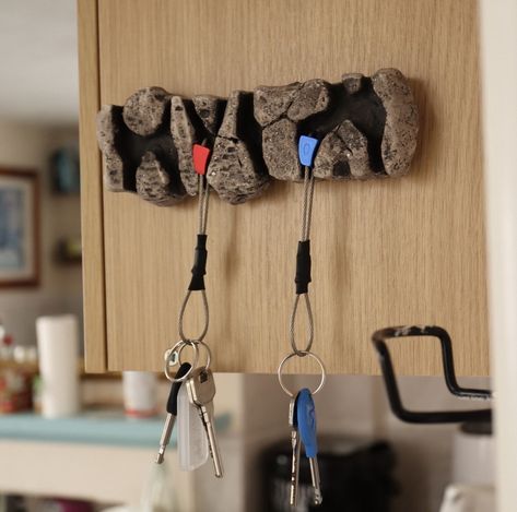 Join the trend and purchase your hand-made Rock Climbing Key Holder with Keychains! 🪨 ️  Large Key Holder: - Handcrafted, large rock climbing key holder providing a fun way to hang your keys. - Features authentic texture, measuring 20cm x 7cm x 3cm. - Easy installation with sticky tape or embedded keyhole attachments. - Includes 6 colourful, climbing nut keychains for functional fun. - Comes in a padded gift box, perfect for any climbing enthusiast. Small Key Holder: - Handcrafted, small rock c Rock Climbing Decorations, Climbing Gifts For Him, Rock Climbing Keychain, Climbing Gear Organization, Rock Climbing Art, Small Key Holder, Hygge Wall Art, Climbing Design, Rock Climber Gifts