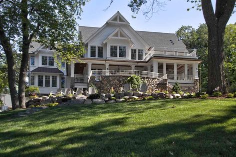 Tour a farmhouse lakeside retreat nestled on the shores of Lake Superior Farmhouse On The Lake, Lakeside Farmhouse, Shingle Siding, Standing Seam, Lake Cottage, Farmhouse Exterior, Lake Superior, Pretty House, House Layouts