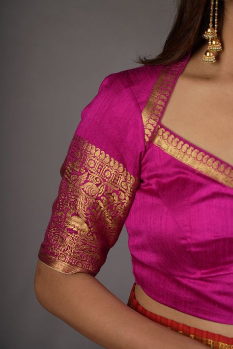 A regal design set in rich rani pink hues, this raw silk blouse comes in an elegant Wide Diamond neck and an intricate Vanasingaram zari design on Pure Raw Silk Fabric. Need minor customizations such as altering the sleeve length or neckline? Or if you are looking for a custom size. Ask us and we will try our best to m Wedding Blouse Design, Silk Blouse Pattern, Raw Silk Blouse, Blouse Designs High Neck, Model Blouse, Blouse Designs Catalogue, Latest Blouse Designs Pattern, Rani Pink, Best Blouse Designs