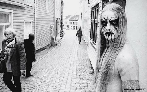 Kvitrafn from the band Jotunspur stands on a street in Bergen, Norway and wears make up in the 'corpse paint' style favoured by black metal bands - passerby look on in bewilderment. Photo by Peter Beste. Black Metal Art, Heavy Metal Music, Documentary Photographers, Music Photo, Dubstep, Metal Music, Robert Pattinson, Metal Bands, New Yorker