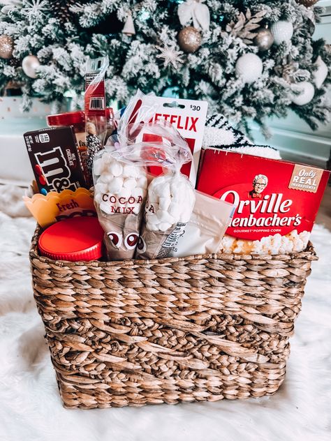 Gift basket idea for the movie lover! #giftbasket Follow my shop @torigerbig on the @shop.LTK app to shop this post and get my exclusive app-only content! #liketkit #LTKSeasonal #LTKfamily #LTKGiftGuide @shop.ltk https://liketk.it/3WwWO Movie Lover Gift Basket, Christmas Eve Basket, Xmas Gift Baskets, Winter Gift Basket, Movie Basket, Movie Basket Gift, Family Gift Baskets, Movie Night Gift Basket, Movie Night Gift