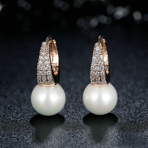 BUY OVER 2 PIECES GET 40% OFF: AUTO DISCOUNT BUY 2 PIECES 30% OFF USE CODE: HUGE30 Free Shipping for over $39 Vintage Pearl Earrings Take a look at our beautiful pearl earring design. These pearl drop earrings have been designed by a nature-originated jewelry designer and are made with faux pearls to give you an affordable and vintage style. Made with shell pearls and silver pins, these pearl earrings are easy to care for and will take your look from casual to formal in an instant. Product Speci Pearl Diamond Dangle Earrings, Vintage Pearl Earrings, Handmade Pearl Jewelry, Pearl Earrings Designs, Mother Of Pearl Jewelry, Diamond Dangle Earrings, Vintage Pearl, Pearl Earring, Silver Pin