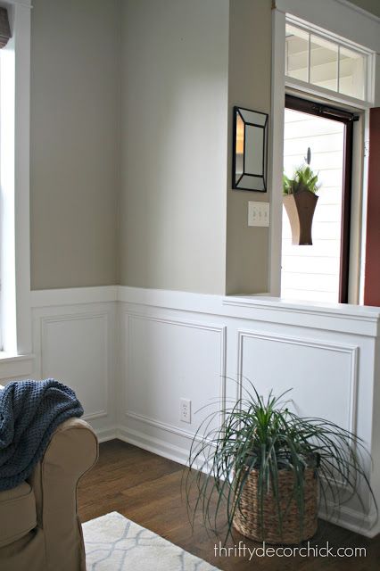 square molding on walls.  Half wall bookcase before. Half Wall Framing, Picture Frame Molding Half Wall, Lower Wall Paneling Ideas, Half Wall Bookcase, Foyer Wainscoting, Pony Wall Ideas, Half Wall Decor, Half Wall Room Divider, Half Wall Ideas