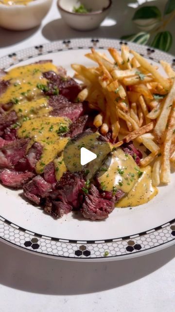 Nadia Aidi on Instagram: "Steak Frites & Béarnaise for ep.5 of my restaurant series. Comment ‘STEAK FRITES’ and I’ll DM you the full recipe with tips & subs! Otherwise scroll down for the condensed version. 
This was the first sauce I learned to cook while working in the industry.
 I’ve taken some liberties with the Bernie clearly…but I love it this way!

* 1 shallot (brunoise).
* 2-3 yolks.
* 2.5 tsp red wine vinegar.
* 2.5 tsp white wine.
* 1.5 tbsp fresh tarragon
* 1 tbsp fresh chives (more for topping).
* 8 oz unsalted melted butter.
* 1 tsp dried tarragon.
* 2 squirts tabasco.
* 1/4 tsp white pepper.
* Salt & Black pepper to taste.
* 2-4 ribeyes.
* 4 russet potatoes.
* Neutral oil for frying the potatoes.

Directions:
1. Peel the potatoes and cut to desired thickness for the fries. So Steak And Fries Dinner, Steak Frites Recipe, Steak And Fries, Steak Frites, Quick Dinners, Pepper Salt, Steak Fries, Wine Vinegar, Russet Potatoes