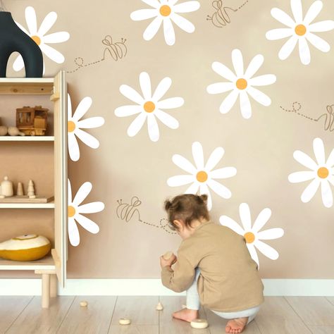 Looking to create a cozy nursery for your little one? Check out these stylish baby room decor ideas that will transform any space into a dreamy haven. From adorable wall art to cute crib accessories, these tips will help you design the perfect baby room. Wall Art For Baby Room, Simple Wall Art Painting Bedrooms, Girls Flower Bedroom, Simple Wall Murals, Daisy Decals, Wall Painting Ideas Bedroom, Babies Bedroom, Hours Painting, Big Daisy