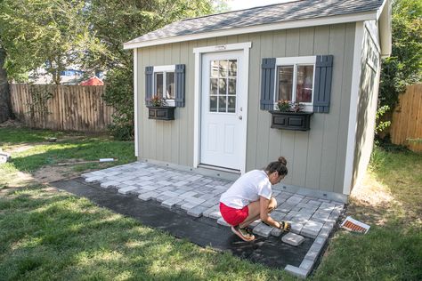 Diy Shed Upgrades, Small Deck For Shed, Patio And Shed Ideas, Diy Shed Porch, Paint Shed Ideas Backyards, Front Of Shed Ideas, Raised Shed Landscaping Ideas, Front Of Shed Landscaping, Pavers In Front Of Shed