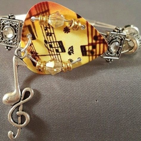 Unique Handmade Bracelet Made From Guitar Pick, Guitar Strings, Swarovski Crystals And Silvertone Beads And Charm "Amber Music Notes" Bracelet Length - 7inches Clasp Closure Brand New Guitar Pick Bracelet, Guitar Bracelet, Music Note Bracelet, Pick Guitar, Guitar Ring, Guitar String Jewelry, Guitar String Bracelet, Guitar Pick Jewelry, Diy Guitar