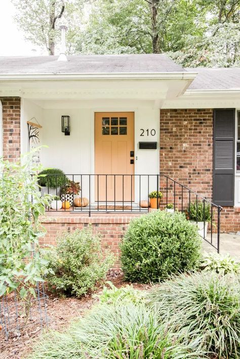 Fall Small Front Porch Decor, Small Fall Porch, Orange Brick Houses, Small Front Porch Decor, Bright Front Doors, Orange Front Doors, Front Door Color, New Front Door, Orange Door