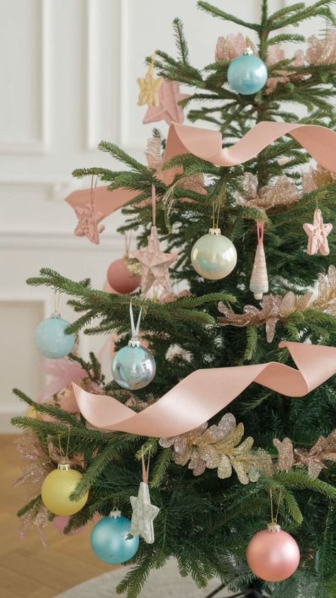 #christmasdecor #holidaydecor #festivehome #christmasdiy #holidayinspiration #creativeholiday #christmasdecorations #homedecorideas Pink Pastel Christmas Tree, Pastel Themed Christmas Tree, Pastel Tree Christmas, Boho Pink Christmas Tree, Green Christmas Tree With Pink Ornaments, Pink Ombre Christmas Tree, Pastel Pink Christmas Tree, Pastel Christmas Tree Ideas, Pastel Christmas Ornaments