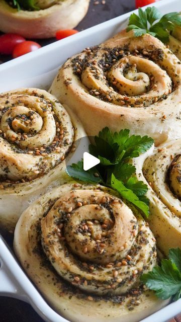 ‎♥️🇵🇸بنت فلسطين‎ on Instagram: "Zaatar Rolls

These were so light and fluffy and were made using my 10 minute dough recipe. The flavor of zaatar in these is perfect and not overpowering and they're the perfect snack or breakfast with labneh and tomatoes. If you really want to, add some cheese (ackawi or mozzarella) on top of the zaatar mixture! These will be a stunner at brunch.

You can find the recipe linked in my bio or copy and paste this! 
https://falasteenifoodie.com/zaatar-rolls/

#zaatarbread #zaatar #lebanese #lebanesefood #palestinianfood #arabfood #arabicfood #middleeasternfood #mediterraneanfood #manakeesh #manouche #manaeesh #manaeeseh #fatayer" Zaatar Rolls, Zaatar Recipe, Lebanese Recipes, Copy And Paste, Middle Eastern Recipes, Arabic Food, Dough Recipe, Mediterranean Recipes, 10 Minute