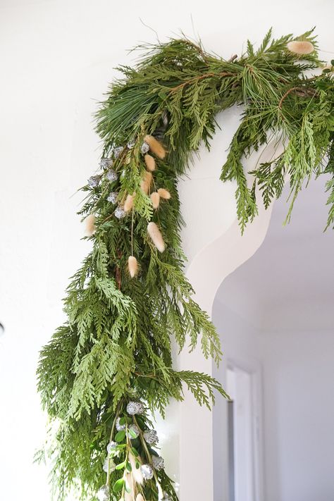 What I use to strongly, but temporarily hang garland in my house without damaging the walls. How To Hang Garland Around Doorway, Railing Spindles, Deck Stair Railing, Build A Deck, Stair Rail, Snowflake Garland, Stair Railing Design, Christmas Is Over, Deck Railing