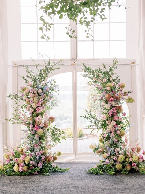 Ceremony Flowers Aisle Entrance, All Pink Wedding Flowers, Deconstructed Flower Arch, Pastel Wedding Arch Flowers, Colorful Flower Arch, Sage Green Wedding With Colorful Flowers, Floral Arch Wedding Indoor, Pastel Floral Arch, Wedding Arch Spring