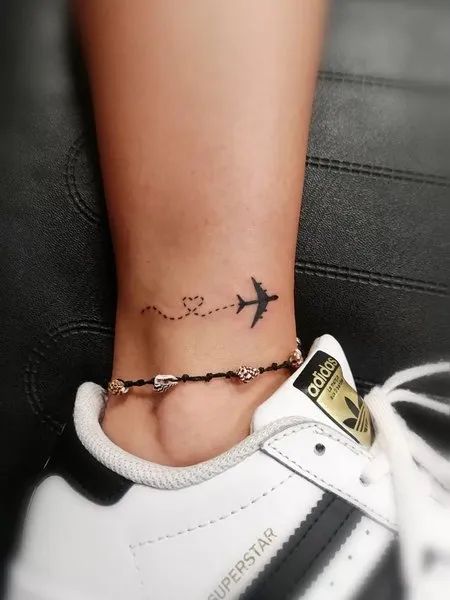 Little Airplane Tattoo, Tattoo Ideas For Travelers, Airplane Tattoos For Women, Airplane Travel Tattoo, Tattoo On Ankle For Women, Tiny Airplane Tattoo, Ibiza Tattoo Ideas, Airplane Tattoo Small, Small Plane Tattoo