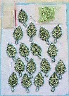 Beaded leaf schema - directions in French. #Seed #Bead #Tutorial Beaded Leaves, Bordados Tambour, Beaded Fabric, Beadwork Tutorial, French Beaded Flowers, Motifs Perler, Beading Crafts, Beaded Leaf, Beading Jewelery