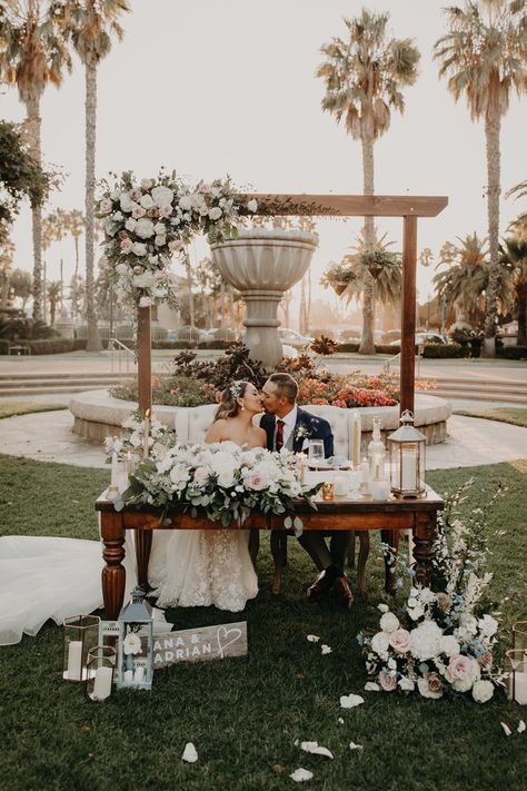 Carousel House Wedding in Santa Barbara— SoCal Wedding Photographer | Head table wedding, Bride groom table, Sweetheart table wedding Head Table Wedding Decorations Outdoor, Wedding Table Decorations For Bride And Groom, Backdrop Bride And Groom Table, Groom And Bride Table Rustic, Candelabra Sweetheart Table, Wedding Decorations Bride Groom Table, Wedding Table For Bride And Groom Decor, Bride And Groom Table Greenery, Sweetheart Wedding Table Ideas