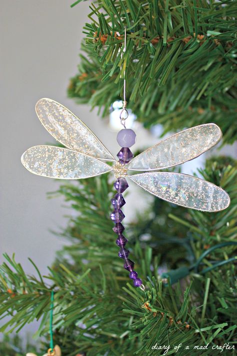 DIY Dragonfly Charmhttp://diaryofamadcrafter.wordpress.com/2012/12/28/diy-dragonfly-charm/ Diy Dragonfly, Dragon Fly Craft, Dragonfly Ornament, Free Crafts, Beaded Dragonfly, Christmas Is Over, Dragonfly Art, Dragonfly Charm, Beaded Ornaments