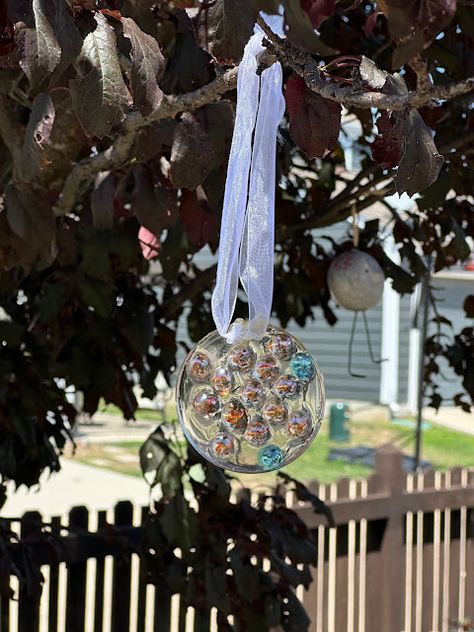 DIY Resin Suncatchers | Our Good Life Resin Suncatcher Diy, Resin Suncatcher, Suncatchers Diy, Bandanas Diy, Suncatcher Diy, Sun Painting, Elmer's Glue, How To Make Box, Faux Stained Glass