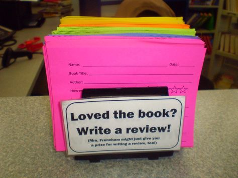 from the Biblio Files: Posting Reviews Reading Book Classroom, Take Your Child To The Library Day Ideas, Elementary Library Set Up, Library Decoration Ideas, School Library Aesthetic, Passive Programming, Circulation Desk, Passive Programs, School Library Displays