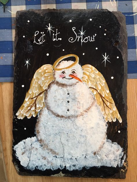 Individually handpainted snow angel with her beautifully feathered wings and twigs for arms. She wears her halo slightly askew as if she's been mischievous and definitely has a twinkle in her eye. Slate features 'let it snow' in naive lettering and measures approx 21cm x 31 cm. Slate is varnished for added protection. A slate to welcome all visitors throughout the season. Feathered Wings, Painted Slate, Snow Angel, Home Decor Christmas, Snow Angels, Christmas Home Decor, Mothers Day Presents, Decoration Christmas, Let It Snow