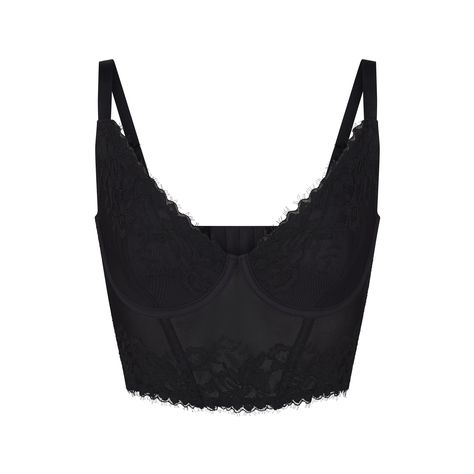 Flatter your bust in this lingerie top with feminine touches like scallop lace details and sheer tulle lining. This demi corset features lined cups for extra coverage, fully adjustable elastic straps, supportive underwire, boning details, and a back hook and eye closure. Complete the look with coordinating Dipped Hipster. Fits true to size. | SKIMS Lined Demi Corset | Black | 4X | SKIMS Lace Black Lace Corset Top, Corset Black, Black Lace Corset, Black Corset Top, Lace Corset Top, Lingerie Top, Fashion Vocabulary, Lingerie Tops, Cute Lingerie