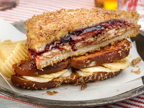 Crunchy Fried PB and J Recipe from the Sandwich King- sounds weird but all the reviews gave it 5 stars. Dessert Sandwiches, Pb Recipes, Peanut Butter Slice, Pb And J, Jeff Mauro, Dessert Sandwich, Crisp Bread, Sliced Banana, Panini Recipes