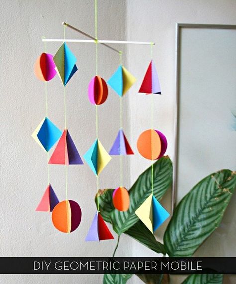 I looooooove mobiles. Love 'em. I love the energy they bring into a space, the visual interest, and the fact that they're not too terribly difficult to make yourself. And this DIY paper version? Easy peasy!     #diy Mobiles For Kids, Mobile Craft, Origami Mobile, Make A Mobile, Mobile Hanging, Paper Mobile, Diy Mobile, Diy Bricolage, Mobile Art