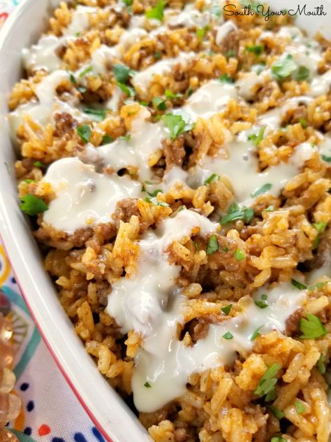 Taco Rice Skillet Dinner with Queso! A one-pan recipe made with ground beef, taco seasoning and Mexican style rice drenched in an easy queso cheese sauce. Queso Cheese Sauce, Taco Rice Skillet, Mexican Style Rice, Easy Queso, Beef Taco Seasoning, Ground Beef Taco Seasoning, Easy Supper Recipes, Ground Beef Taco, Taco Rice