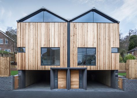 Twin wooden houses by Adam Knibb Architects are raised up above street level. Townhouse Ideas, Houses Architecture, Townhouse Designs, Wooden Buildings, Timber Cladding, Duplex House, Timber House, Row House, Eco House