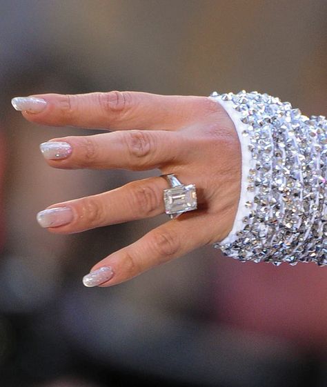 All Of Jennifer Lopez's Engagement Rings Hit On The Same Major Jewelry Trend J Lo Engagement Ring, Jlo Engagement Ring, Dream Proposal, Oval Sapphire Engagement Ring, Vintage Engagement Rings Sapphire, Trending Engagement Rings, Vintage Sapphire, Ring Trends, Wedding Rings Halo