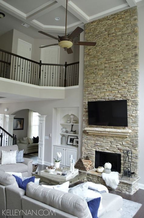 two story great room | stacked stone fireplace | rock fireplace | coffered ceiling | neutral living room | built-ins | neutral living room fall decor Fireplace Rock, Stacked Stone Fireplace, Rock Fireplace, Stacked Stone Fireplaces, Living Room Built Ins, Fall Living Room Decor, Living Room Decor Fireplace, Fireplace Remodel, Family Room Decorating