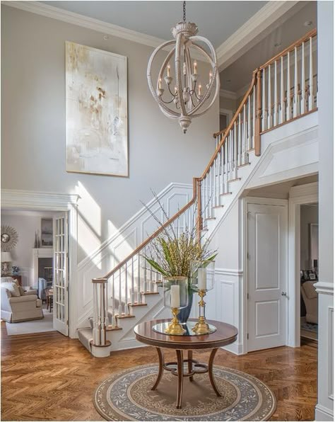 Foyer Chandeliers for Two Story Homes | Centsational Girl 2 Story Foyer Lighting, Foyer Paint Colors, Foyer Paint, Foyer With Stairs, Traditional Foyer, تحت الدرج, Foyer Ideas Entryway, Foyer Staircase, Entryway Chandelier