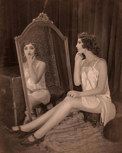 Sitting At Vanity Pose, Woman Looking In Mirror Painting, Looking In Mirror Pose Reference, Woman Looking In Mirror Art, Person Doing Makeup In Mirror, Vintage Mirror Photoshoot, Mirror Reference Pose, Standing In Front Of Mirror Reference, Looking At Mirror Reference