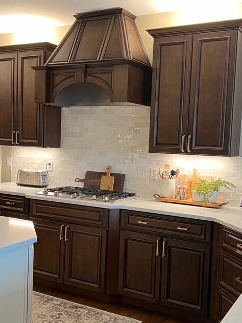 Dark cabinets with lighter counters and backsplash. Kitchen Dark Backsplash, Dark Backsplash Kitchen, Dark Kitchen Backsplash, Kitchen With Dark Brown Cabinets, Kitchen Backsplash With Dark Cabinets, Dark Backsplash, Dark Brown Kitchen Cabinets, Dark Brown Kitchen, Dark Brown Cabinets Kitchen