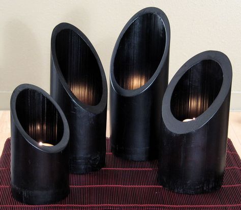 DIY bamboo votive holders. This would look great even if it wasn't painted black! Bamboo Candle Holder, Bamboo Furniture Diy, Bamboo Home, Diy Bamboo, Bamboo Candle, Bamboo Diy, Bamboo Decor, Bamboo Architecture, Bamboo Light