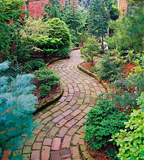 A curved pattern adds a sense of movement to this charming garden path. More glorious garden paths: http://www.bhg.com/home-improvement/outdoor/walkways/garden-paths/?socsrc=bhgpin060712 Kebun Herbal, Brick Pathway, Brick Path, Brick Walkway, Walkways Paths, Desain Lanskap, Garden Walkway, Have Inspiration, The Secret Garden