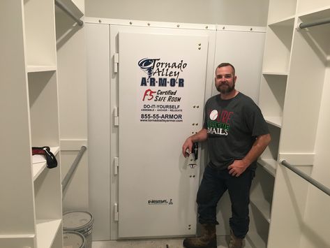 Here's a great example of what can be done with a walk in closet. This 5 adult Defender safe room fits neatly at the end of the closet leaving room for hanging clothes and shelves. Give us a call to find out what we can do for you at Tornado Alley Armor. Toll free 855-55-ARMOR. Hidden Storm Shelter Safe Room, Closet Storm Shelter, Walk In Safe Room, Small Safe Room Ideas, Tornado Room In House, Diy Panic Room, How To Build A Safe Room In Your House, Safe Room In Closet, Tornado Safe Room In House