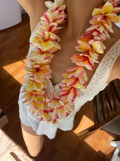 Girl wearing plumeria lei in Hawaii, Summer in hawaii, hawaii summer aesthetic, lei, lei making, plumeria flower, summer aesthetic, summer fashion, pink flowers Flower Summer Aesthetic, Summer In Hawaii, Lei Day, Hibiscus Wedding, University Of Hawaii At Manoa, Aesthetic Summer Fashion, Lei Making, Hawaii Flowers, Romance Movie