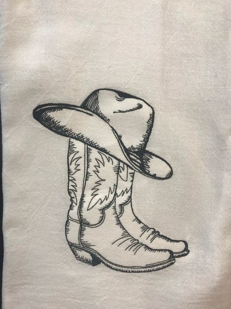 Embroidered flour sack towel with a sketch of cowboy boots and hat True to the character of real flour sack, there may be random colored threads in the weave...embrace the imperfections, it's all part of the charm. Cowboy Boots Drawing, Hat Sketch, Cowboy Boot Tattoo, Cowboy Hat Tattoo, Cowboys Boots, Cowgirl Tattoos, Cowboy Tattoos, Western Tattoos, Dream Tattoos