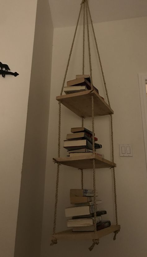 Hanging bookshelf Hanging Bookcase On Wall, Tiny Bookshelf Ideas, Hanging Bookshelves Bedroom, Decorating Bookshelves Living Room, Hanging Book Shelves, Decorate Empty Wall, Hanging Book Shelf, Bookshelf Hanging, Wall Hanging Bookshelf