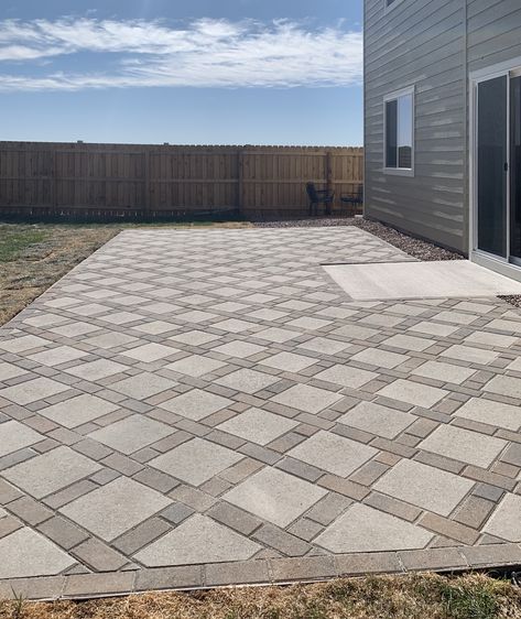 Patio made up of pavers using 12”x12” concrete pavers, standard bricks and finished with Paver Set. Simple Backyard Paver Ideas, Paver Designs Patterns Concrete, 12x12 Paver Ideas, Deck And Pavers Patio Design, 12x12 Concrete Paver Ideas, 12 Inch Paver Patio, Patio With Concrete And Pavers, 12x12 Patio Paver Ideas, Pavers And Brick Patio