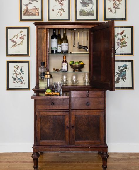 Jen Dulac Interior Design | Nothing says home bar like an…antique dental cabinet?! 🥂 Here’s to hoping that you’re well-stocked for Thursday, and that you’re always… | Instagram Bar Cabinet Decor, Antique Bar Cabinet, Unique Home Bar, Dental Cabinet, Audubon Prints, Wood Trays, Antique Bar, Trim Design, Boutique Interior Design