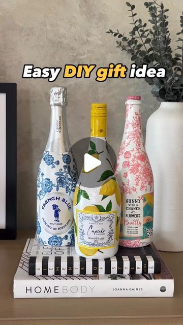 Michelle McRae | “Shelly” Your DIY BFF on Instagram: "Details 👇🏽  If you have ever searched the internet for heartfelt or handmade gifts, these decoupaged bottles are so special. Whether it is for a hostess, bridesmaid, teacher or girlfriend, these decoupaged bottles are both beautiful and one-of-a-kind. Not only that, they’re both easy and affordable also!  Buy a few bottles of bubbly, paint them with any white paint you have laying around your house, glue on the designs or patterns from one pretty napkin and, for a little extra shine, spray on a little paint sealer. Better yet, invite over some girlfriends, and host a DIY night!  Let’s just say, if you invite me over, you know what I’ll be bringing!🍾  Comment “BOTTLE” for links 🔗 (earns commissions)‼️  #easydiys #diygift" Decoupage Wine Bottles With Napkins, Decopage Ideas Wine Bottles, Decoupage Wine Bottles, Decopatch Ideas, Painting Bottles, Diy Bff, Decoupage Bottles, Decoupage Crafts, Decoupage Jars