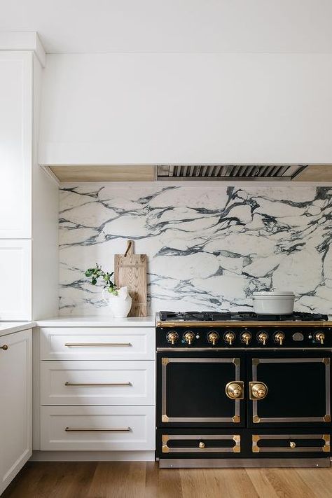 Cooking Alcove, Marble Slab Backsplash, Beadboard Trim, French Stove, Chevron Backsplash, Slab Backsplash, Black Kitchen Design, Kitchen Slab, White Beadboard