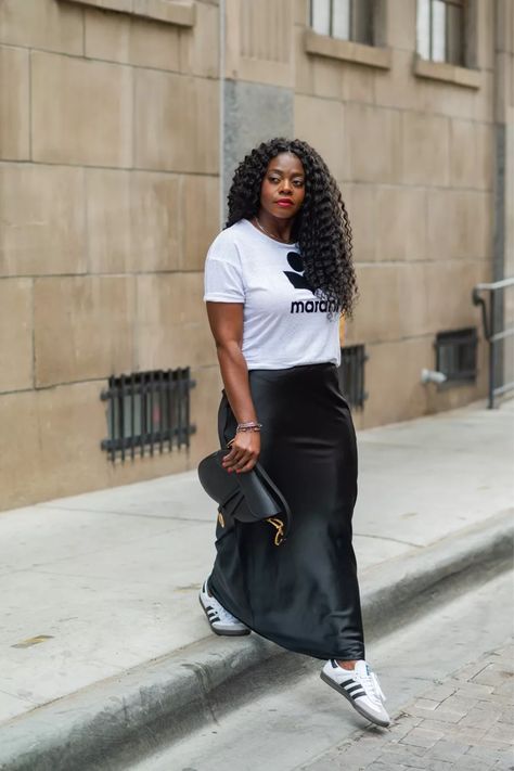 Sneaker meets satin in my latest look!👟✨ Check out how I'm rocking the trendy adidas Sambas with a satin skirt - it's a fusion of sporty and chic! These kicks have even made their way into my YouTube vids, and there's a new one dropping today! Hit the link in my bio for all the details. #SatinSneakerStyle #AdidasSamba #FashionFusion Addidas Shoes Samba Womens Outfit, How To Wear Sambas Women, Adidas Samba Outfit Black Woman, Outfits With Sambas Women, How To Style Sambas, Outfits With Adidas Samba, Skirt And Sambas, Samba Outfits Women, Black Samba Outfit