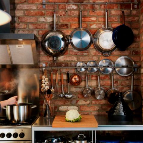 Pots and pans - exposed brick kitchen - FTW! Kitchen With Brick Wall, Exposed Brick Kitchen, Small Kitchen Storage Solutions, Brick Wall Kitchen, Pot Rack Kitchen, Brick Kitchen, Small Kitchen Storage, Kitchen Storage Solutions, Kitchen Pot