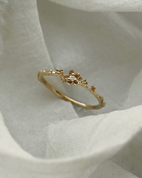 Petite petals of gold to float across your finger🌼 Our Buttercup Ring with a drop of diamond dew glittering at her centre — today is your last chance to get this special customization and more for 15% off on our website! Our Secret Menu Sale ends tonight at 11:59pm EST🧚 Rings On Fingers Aesthetic, Rings Gold Aesthetic, Buttercup Ring, Stylish Jewelry Accessories, Magical Wolf, Hand Jewelry Rings, Gold Finger Rings, Elegant Gloves, Fairy Ring